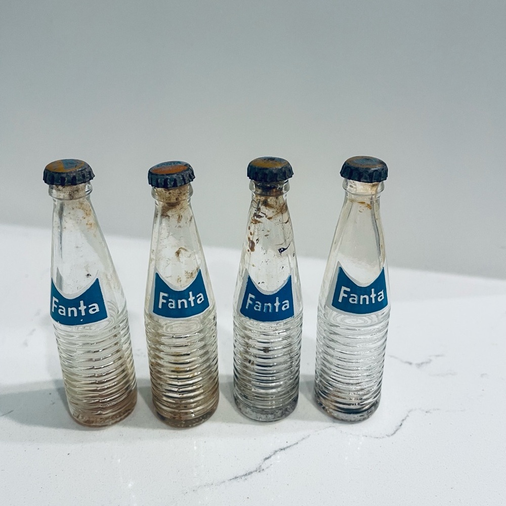 Vintage miniature set of 4 Fanta soda bottles with lids mini glass